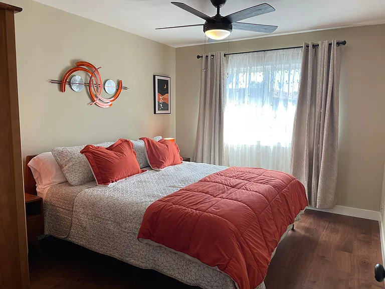 Bedroom 1 features a king bed