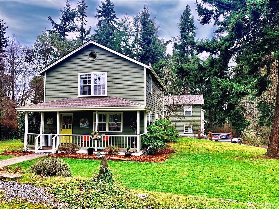 Charming, craftsman w/covered front porch.  Detached garage w/mother-in-law apartment above sits behind.