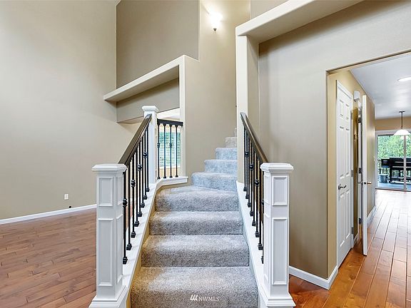 Fortress Rod iron staircase catches the eye as you walk through the front door. 