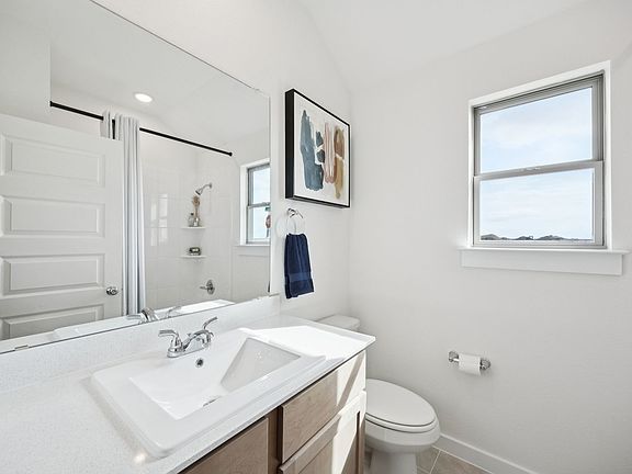 Bathroom in the Diamond home plan by Trophy Signature Homes - REPRESENTATIVE PHOTO