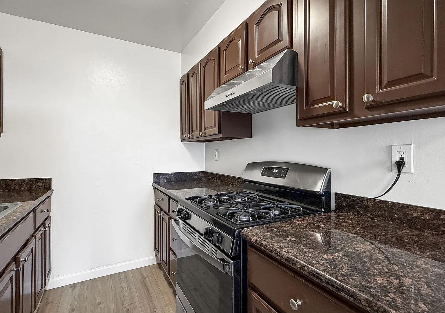 First month FREE! Fantastic Top-Floor Apartment in an Extremely Well-Maintained Gated Building — Photo 3