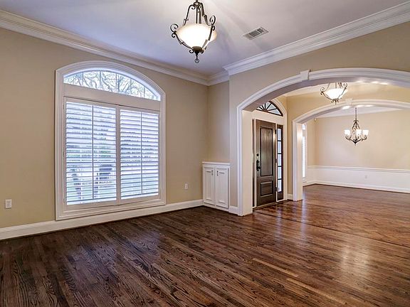 Living room flows to dining