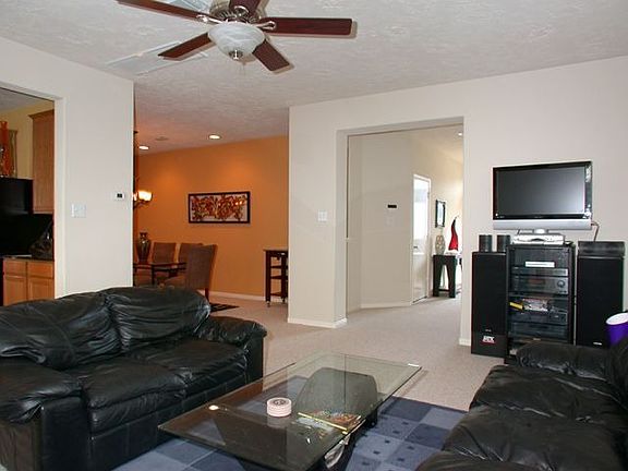 Open floor plan with views of dining room and kitchen.