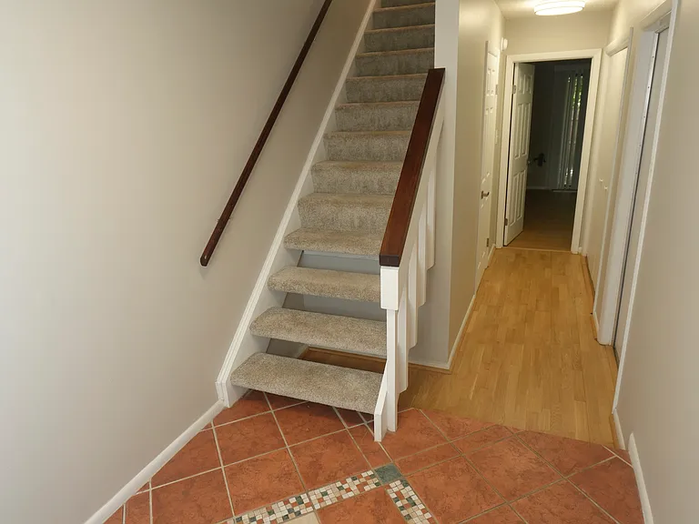Entry foyer; hardwood floor hallway