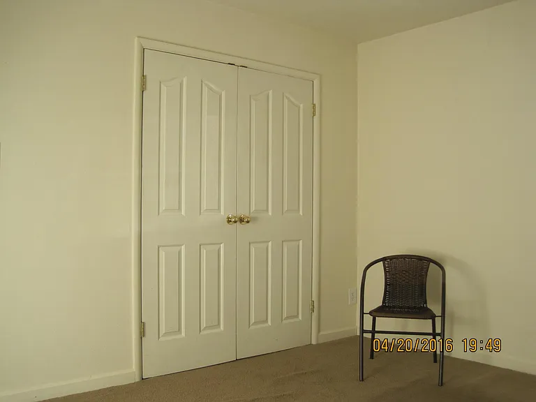 Closet with doors closed.