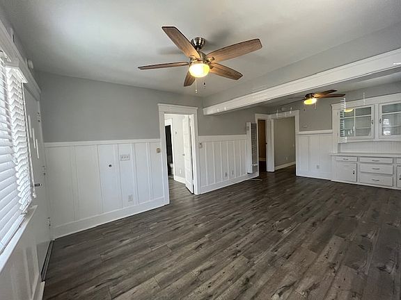 Living room looking towards bedrooms, kitchen entrance