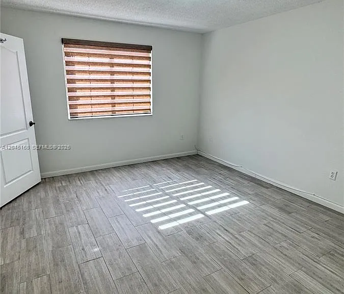 7439 W 22nd Ave #103 — Photo 9