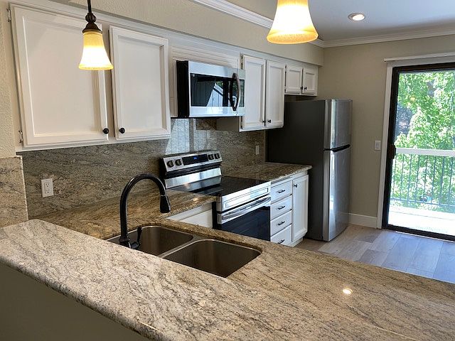 Upstated Kitchen: Granite Counter Tops & Backsplash. Overhead microwave, Dishwasher, Electric Stove and Oven, & Refrigerator.
The Kitchen has room for a table and chairs this room also has a 2nd Balcony to sit and enjoy the outside when wanted.