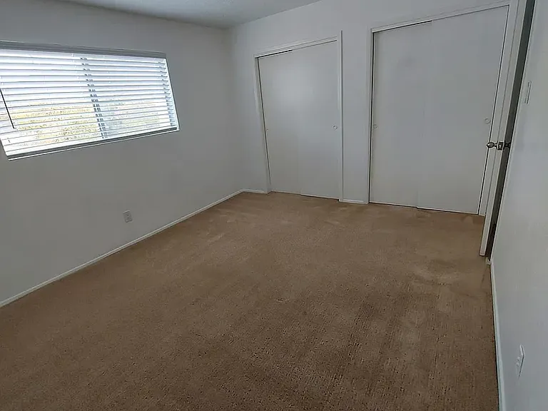 Master bedroom with wall-to-wall double closet