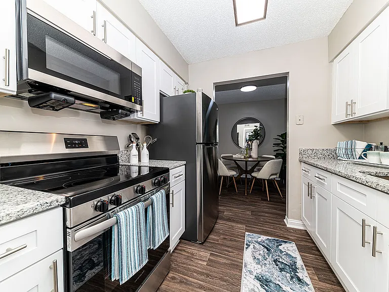 Kitchen with granite counters and stainless appliances