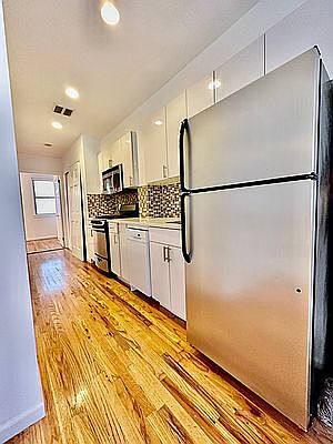 1st image of 303 E 12th St APT 3AB