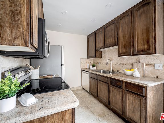 5th image of 8710 Belford Ave APT 209B
