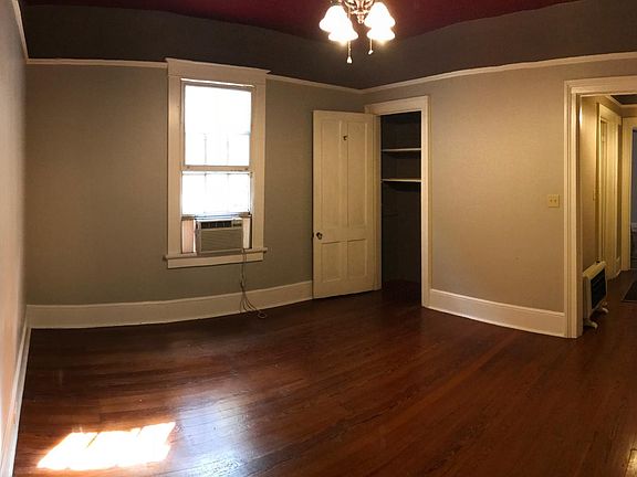 Second room with large closet and built in storage. Ceiling