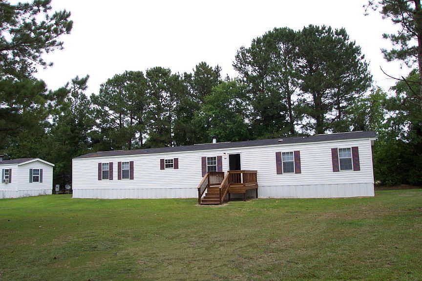 Front with nice deck