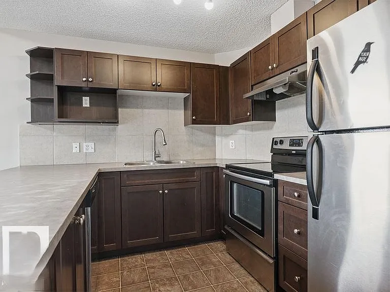 9363 Simpson Dr NW #1408 — Photo 6
