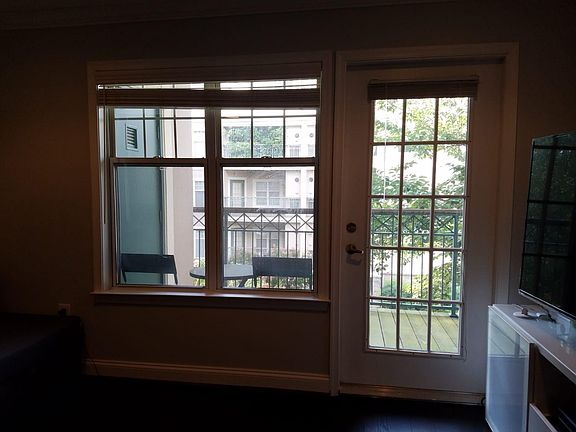 Enjoy lots of natural sunlight coming in through large windows in the family / living area.