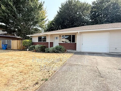 1803 SE Blairmont Dr Photo 1