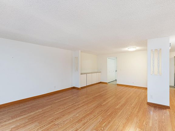 Living/Dining Area w/ Storage Cabinets