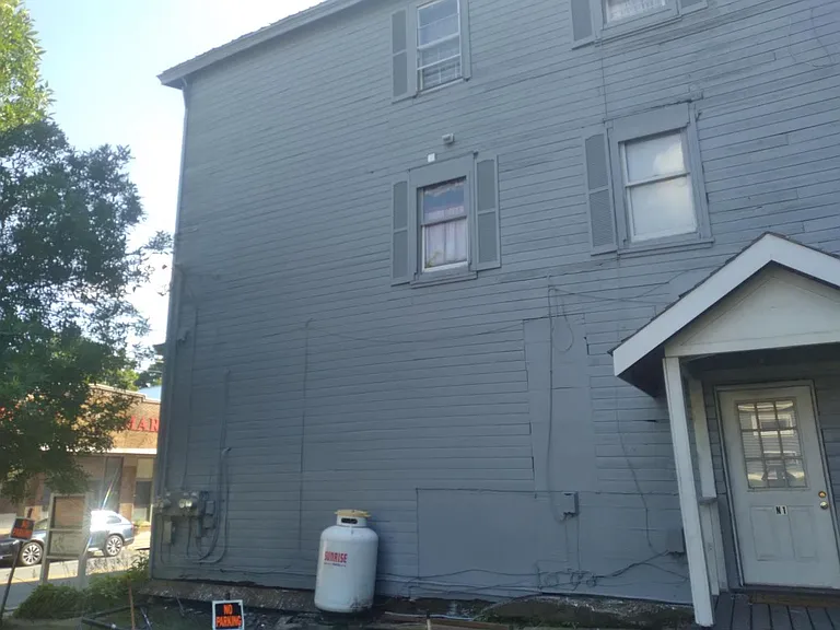 Newly painted exterior on historic property in Hobart "Book Village".