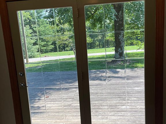 French doors off kitchen with deck
