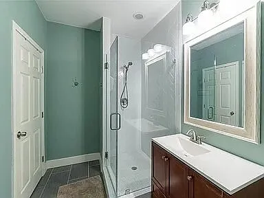 Walk in to your oversized full bathroom with walk-in shower.