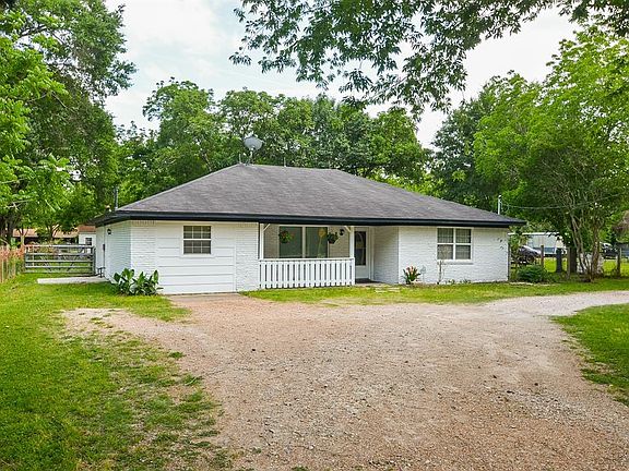 Curb appeal galore! Immaculate landscaping and mature trees give this charming home a welcoming feel from the moment you pull up.
