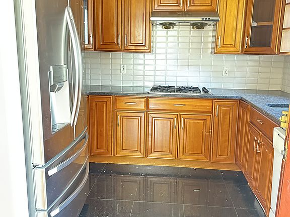 3rd image of 246-08 60th Ave Floor 1