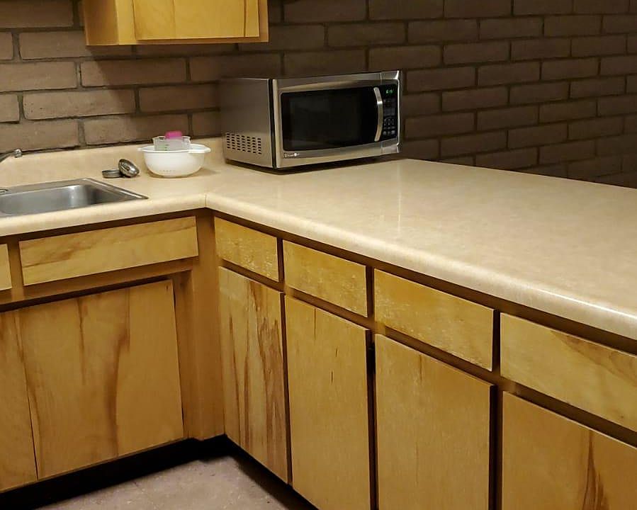 Roomy Kitchen cabinets and a nice large microwave