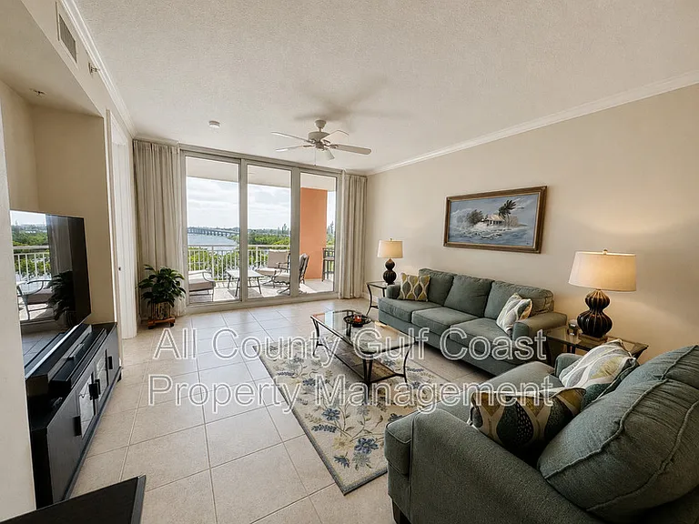 611 Riviera Dunes Way #207 — Photo 2