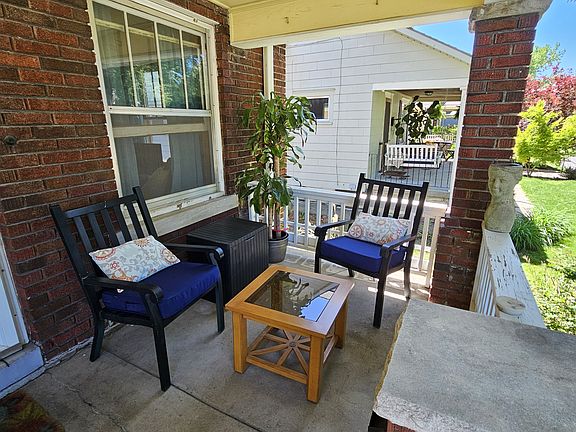 South side front porch - furniture can stay or go.