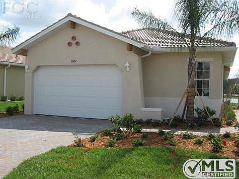 Single family detached villa complete with upgraded landscaping