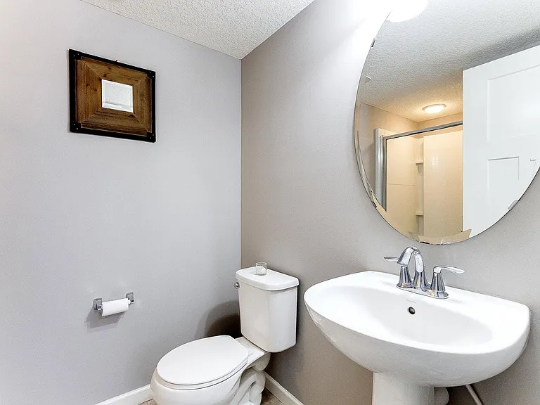 8974 SW Village Loop — Photo 16