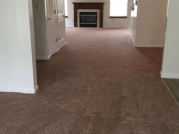 Open floor plan showing gas fireplace.