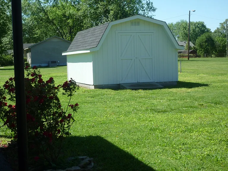 Large dry storage barn with concrete floor, double door entry. 16 x 10.