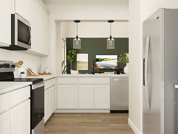 Enjoy a full suite of appliances by Whirlpool in this move-in ready home