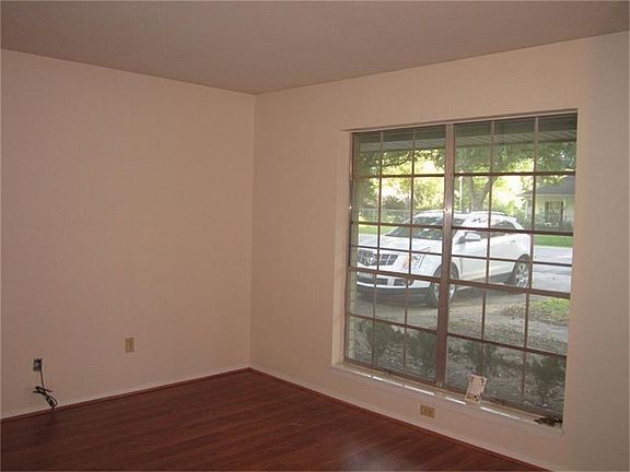 Dining area leading to kitchen