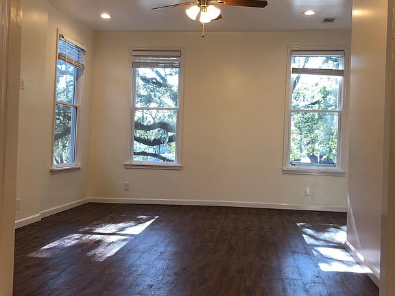 Big living room with tons of natural light.