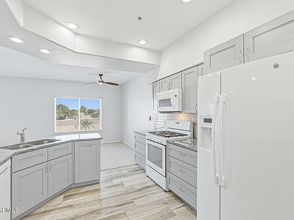 4th image of 7401 W ARROWHEAD CLUBHOUSE Drive #2023