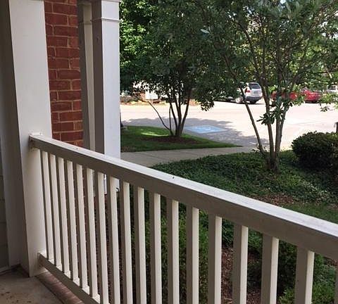 Patio steps away from your reserved parking space