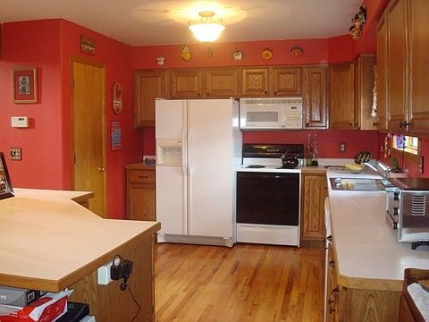 Kitchen with hardwod floors.