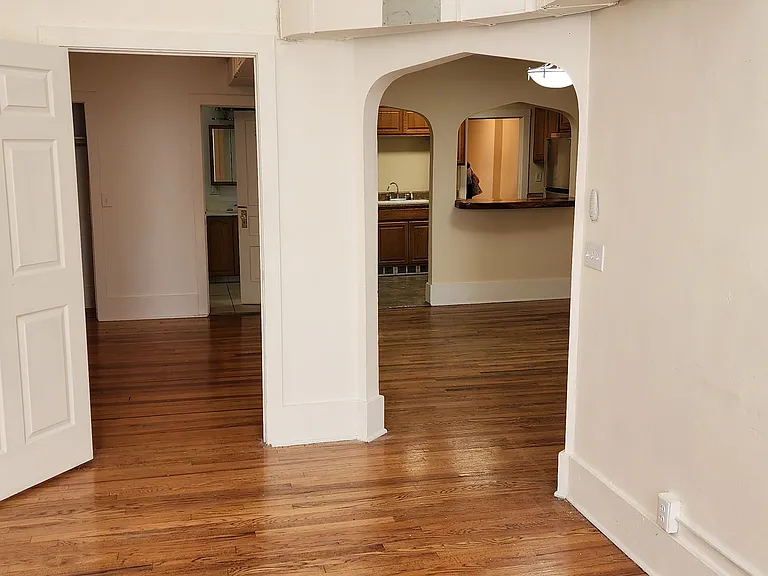 East view from the living room showing dining room and 2nd bedroom.
