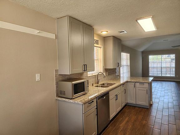 4th image of 8307 Holmwood Dr
