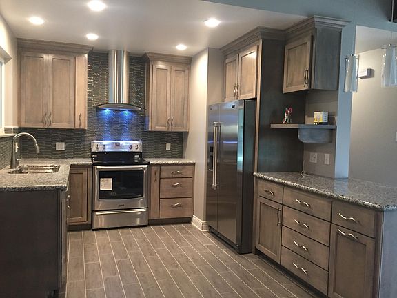 Kitchen with plenty of storage and SS appliances.