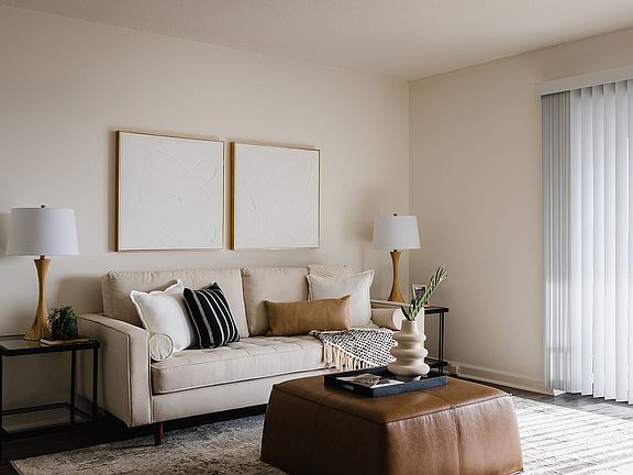 Spacious living room with hardwood-style flooring