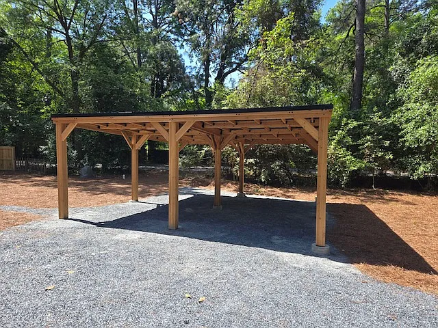 Carport and blue stone driveway