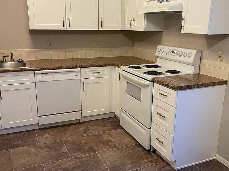 Brand new cabinets. Photo is similar to unit but not exact model.