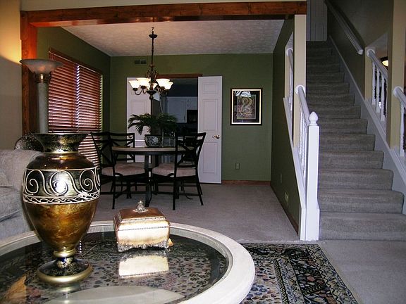 Formal dining room connects to kitchen through double doors
