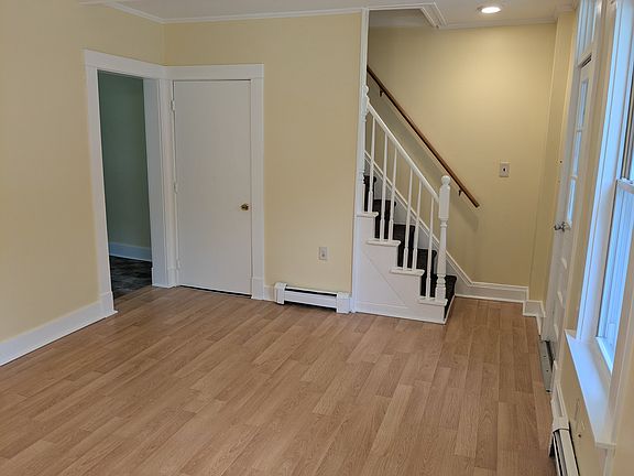 Stairs to second floor and private basement.
