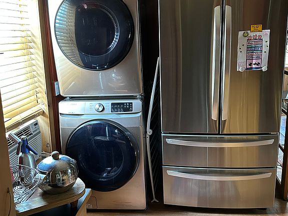 In kitchen Washer/Dryer
Refrigerator with dual freezers