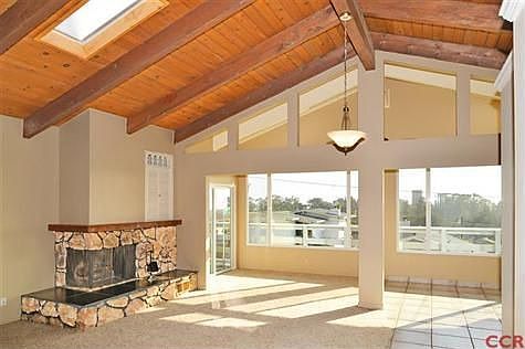 Great room has impressive vertical space.